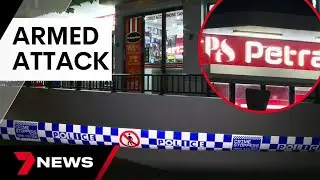 Shopkeeper stabbed after masked thieves raid store | 7 News Australia