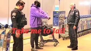 Man Harassing airline travelers tells LAX airport police take me to Jail