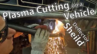 Plasma Cutting on a Vehicle Frame with a spark deflector shield - Circle & Straight cuts