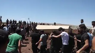 Funerals for 4 killed in Turkish controlled areas of north Syria after protests