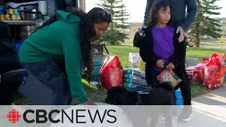 Fort Nelson evacuees flee flames hundreds of kilometres away