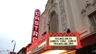 Iconic Castro Theatre sign relit during Juneteenth block party, outdoor film screening