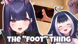 Lily and Numi hold feet in VR