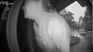 Doorbell cam catches moment woman slips and smacks door