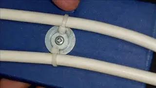 From an old electrician this method of attaching a cable to the wall