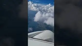 Airplane flies through clouds