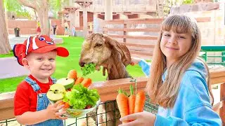 Diana & Roma feed the Animals at the Emirates Park Zoo