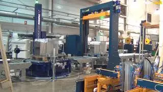 Línea automática de flejado y enfardado de palets