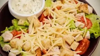 Caesar salad. With chicken and croutons. 2 choices of sauces.