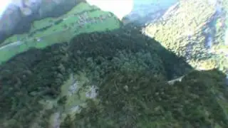 Switzerland base jumping with wingsuit.