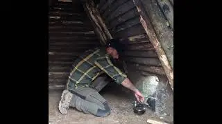 Building bushcraft shelter and outdoor cooking