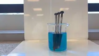 Displacement of copper(II) ions by iron metal