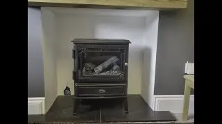 Gail's fireplace mouse in a hole