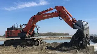 DOOSAN DX255 Excavator Digging Gravel Under Water
