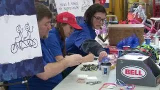 WXMI FOX 17 News - 2017-11-08 Kalamazoo Pfizer Employees Build 75 Bicycles for Children