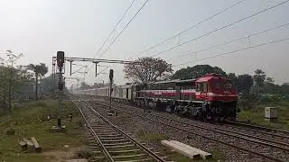 #40110 Red WDP4D powering 04651/Amritsar clone special at full speed.