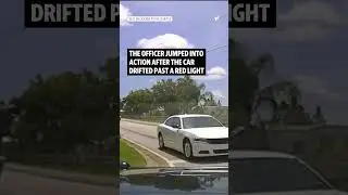 Florida cop saves unresponsive driver at a busy intersection #shorts