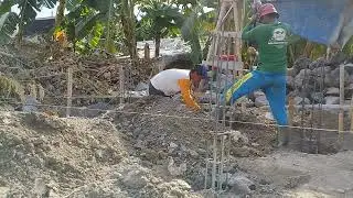 Making foundation excavations for house construction