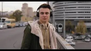 Young Man Listening To Music with Headphones Walking on City Bridge | Stock Footage - Envato ele...