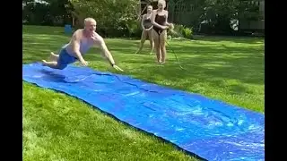 49-year-old shows kids how to dominate the slip and slide l GMA Digital