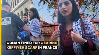 Moment woman fined by French police for wearing keffiyeh scarf