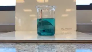 Displacement of silver(I) ions by copper metal