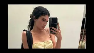 Kylie Jenner teases her toned tummy in a yellow tank top before stripping off to busty sports bra in