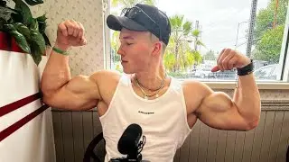 Teen boy flexing muscle