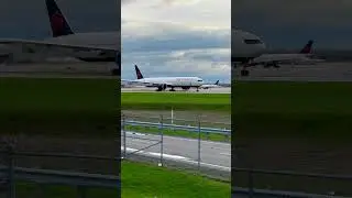 Boeing 777 takes off on a runway