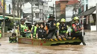 Thailand floods: Rescuers evacuate schoolchildren and residents in Chiang Rai | AFP