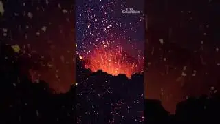 Italys Mount Etna erupting at night