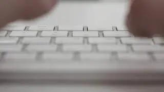 Typescript. Fingers are typing on the keyboard ( Video Background Stock Footage Free )