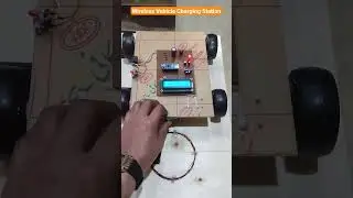 Solar and Wapda based Wireless Vehicle Charging Station