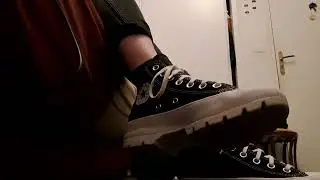 Watch me wearing my friend's Converse sneakers while I comb my hair