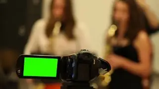 Girls & Record Camera - Green Screen Royalty Free Footage