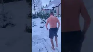 Bathing in the snow after the sauna