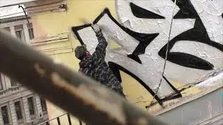 Graffiti bombing .Rebel813. Rooftop graff. Full process. Daylight