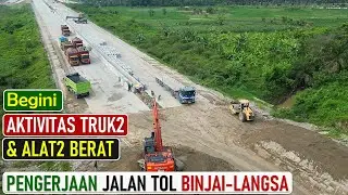 MELIHAT  AKTIVITAS  TRUK  DAN  ALAT-ALAT  BERAT  PENGERJAAN  JALAN  TOL  BINJAI-LANGSA