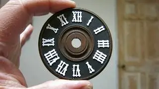 Gluing numbers to a cuckoo clock dial using a 3D printed template