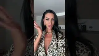 Sexy Venezuela woman modeling leopard print wrap dress #asmr #trending #fashion