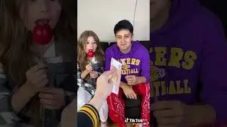 Хабибка и Милана едят яблоки на палочке