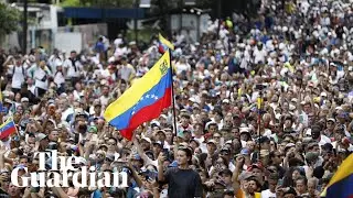 Thousands rally in Venezuela as Maduro threatens to detain defiant leaders of opposition