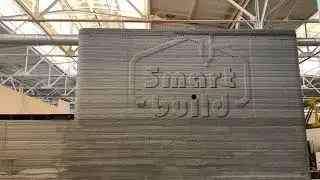 Печать логотипа компании SmartBuild на первом в России двух этажном здании (архив)
