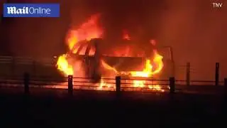 Police car bursts into flames during pursuit