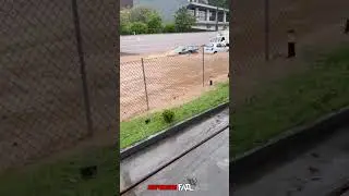 GUY DRIVES HIS NEW FERRARI ON FLOODED STREET #Shorts