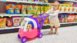 Alice and Baby doll doing shopping in the supermarket