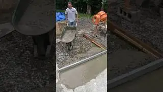 One Man Pours Concrete