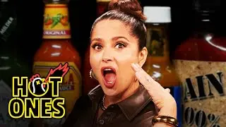 Salma Hayek Adopts Sean Evans While Eating Spicy Wings | Hot Ones