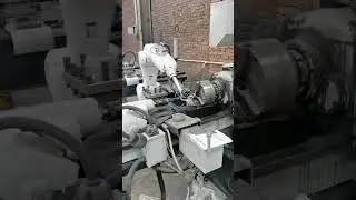 Robotic arm is loading materials.