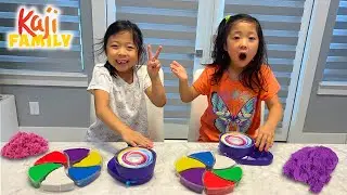 Emma and Kate Play in Kinetic Sand Spin Art!